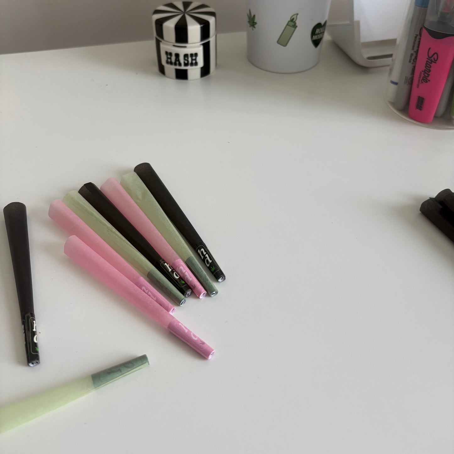 Assorted cones and papers on a white surface